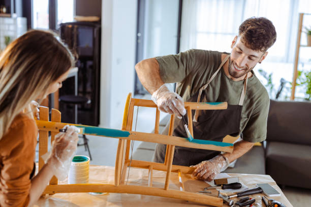 istock Creative young couple is restoring an old chair 2151178626