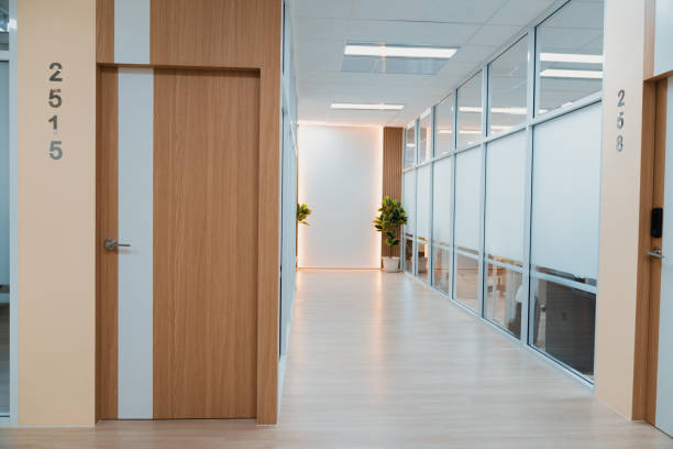 istock Empty modern office bright corridor with glass wall. Hall way. Ornamented. 2151183945