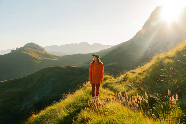 istock Determinted woman hiking in Dolomites mountains in summer 2151184557