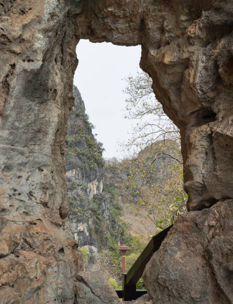 istock The Phanthurat's Mirror a small natural arch at Khao Nang Phanthurat Forest Park. 2151186153