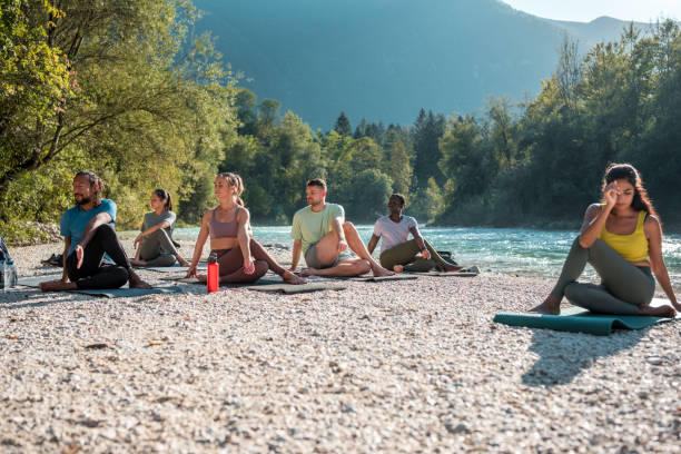 istock Riverbank Serenity Session with Diverse Yogis 2151186345