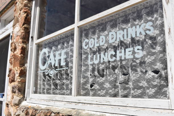 Spencer, MO, USA, 4.13.24. The window at the old cafe at Spencer, MO advertises cold lunches and cold drinks.  Spencer is a tourist attraction along Old Route 66.