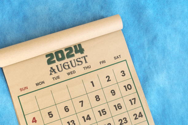 istock August 2024 calendar flat lay in blue background with copy space. 2151192246