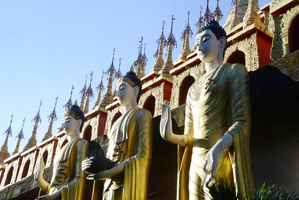 Outdoor Buddhist standing Buddha at Wat Phra That Suthon Mongkhon Khiri Samakkhi Tham it is a temple that was built in 1977. It is a temple that has the outstanding feature of being one of the most beautiful collections of applied Lanna art. Located at Phae Province in Thailand.