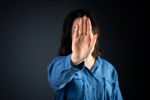 istock Woman shows stop with her hand 2151196169