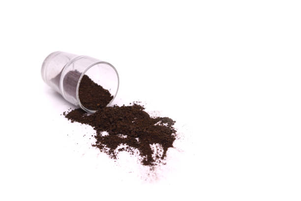istock coffee grounds spilling from the glass 2151196965
