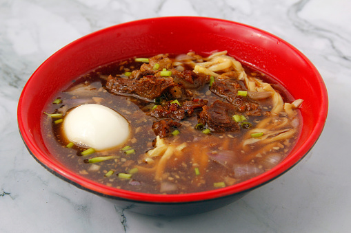 Photo of freshly cooked beef noodle soup.