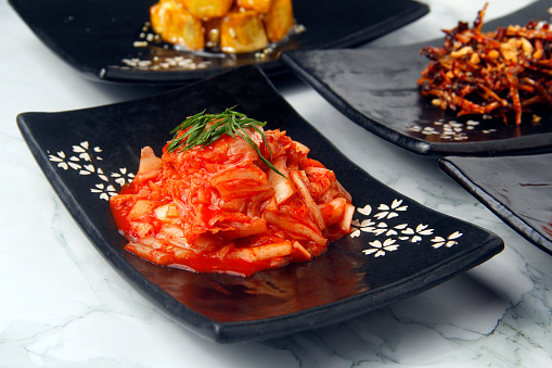 Photo of traditional Korean dish called Kimchi or salted fermented napa cabbage.