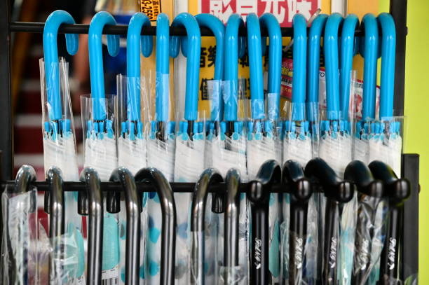 Taiwan - Mar 24, 2024: A close-up of umbrellas sold at Taiwanese stores. Umbrellas are essential in Taiwan due to its warm, rainy climate. They're widely sold in stores across the country.