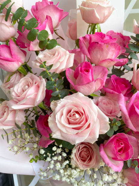 istock Pink tone fresh rose flower hand bouquet arrangement 2151205393