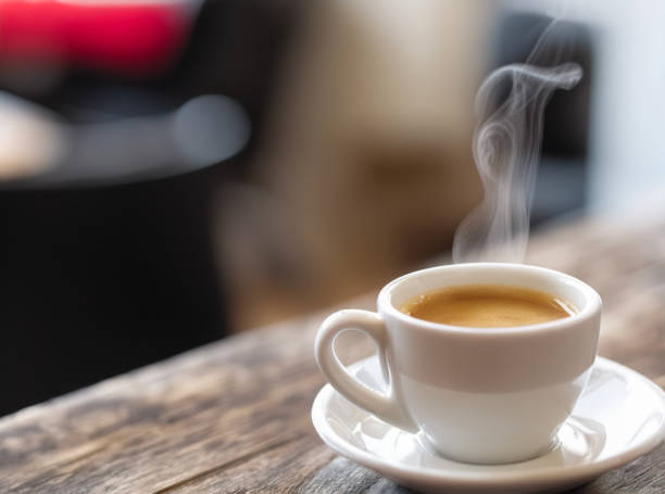 istock Refreshing hot cup of coffee at a cafe 2151207811