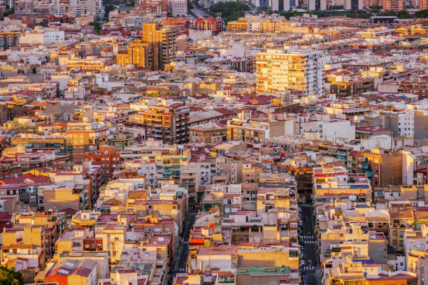 High angle view of Alicante. Densely populated city in Spain. Sunset, Golden Hour.