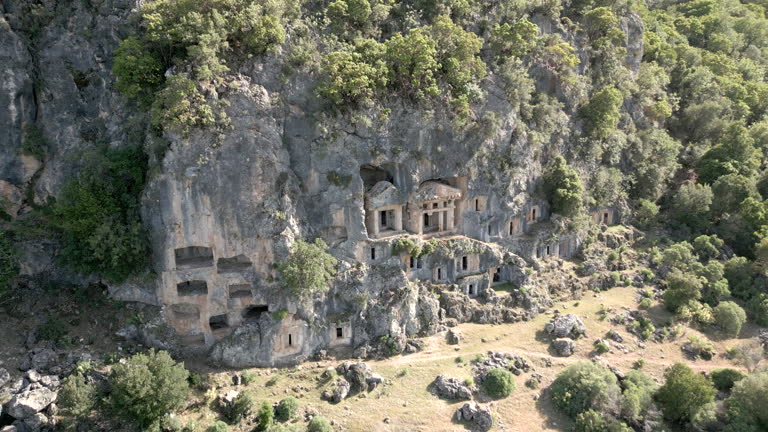 Aerial drone view of Lycian tombs of kings in ancient city of Pinara Lycia close to Lycian way in Fethiye ,Mugla