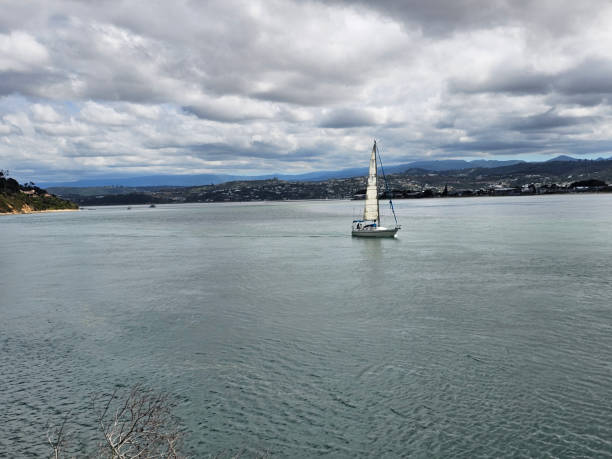 istock Sailboat Sailing on a Vast Sea 2151216325