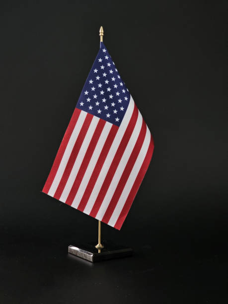 istock american flag isolated on black background concept 2151216898