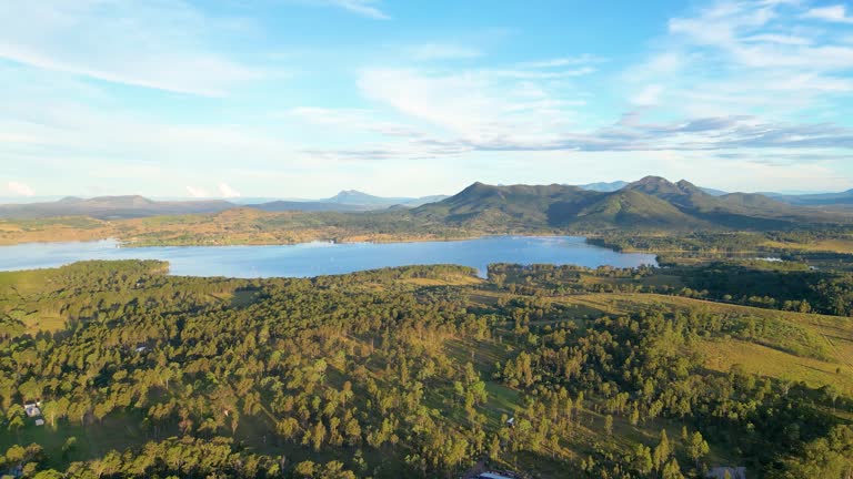 Drone footage of Mount Edwards in Queensland, Australia with Lake Moogerah in the foreground in Autumn.