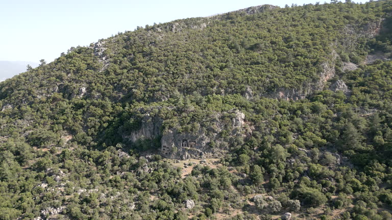 Aerial drone view of Lycian tombs of kings in ancient city of Pinara Lycia close to Lycian way in Fethiye ,Mugla