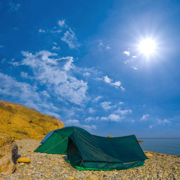 istock touristic camp on summer  sea coast 2151219095
