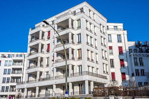White modern apartment buildings seen in Prenzlauer Berg, Berlin, Germany