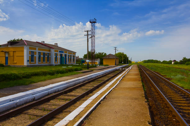 istock railway station  at summer day 2151219231