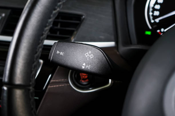 istock Switch off lights in a car. close-up Car integrated turning indicator with headlight switch toggle. 2151224278