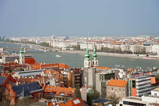 Panoramic view on skyline of Budapest city along Danube River. Architecture of capital of Hungary with historical buildings and famous landmarks