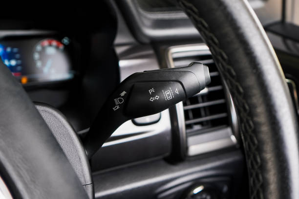 istock Switch off lights in a car. close-up Car integrated turning indicator with headlight switch toggle. 2151224838