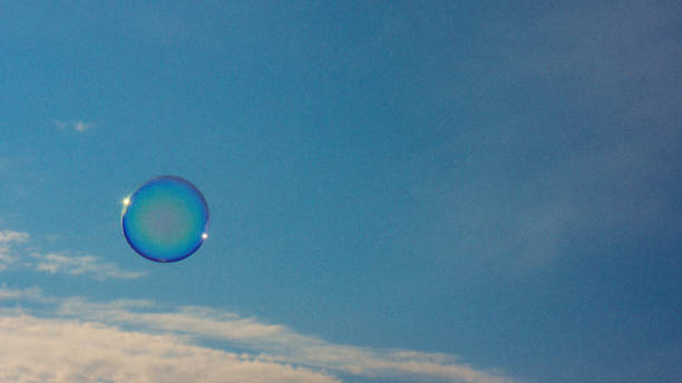 Bubbles floating in the air with St Paul's Catherdal, London in background.
