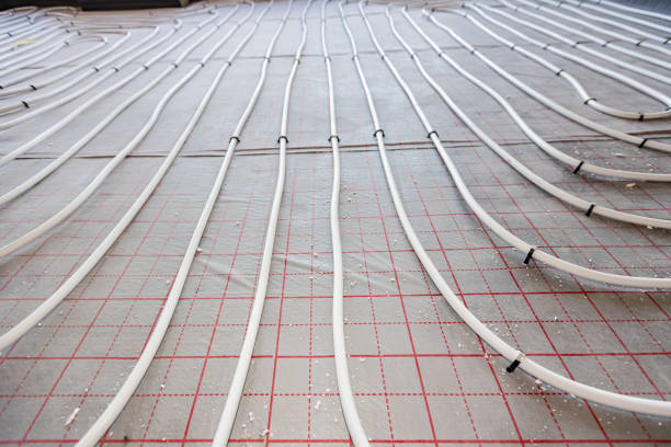 istock Pipe system of floor heating mounted in residential building under construction 2151238981