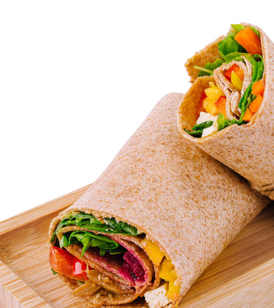 istock Fresh chicken wrap sandwich on wooden board 2151241328