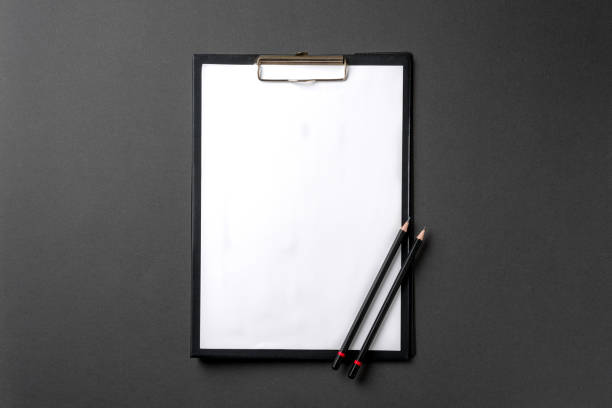 istock Blank A4 paper attached to the clipboard and pencil on it 2151244335