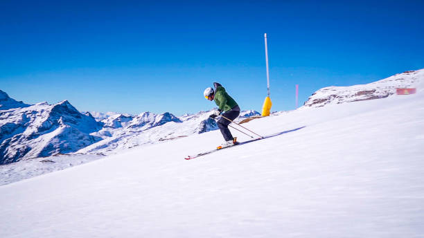 istock Professional ski instructor speed skiing on Italian Alps (Monte Rosa) 2151247624