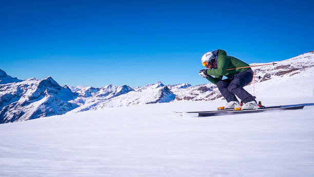 istock Professional ski instructor speed skiing on Italian Alps (Monte Rosa) 2151247711