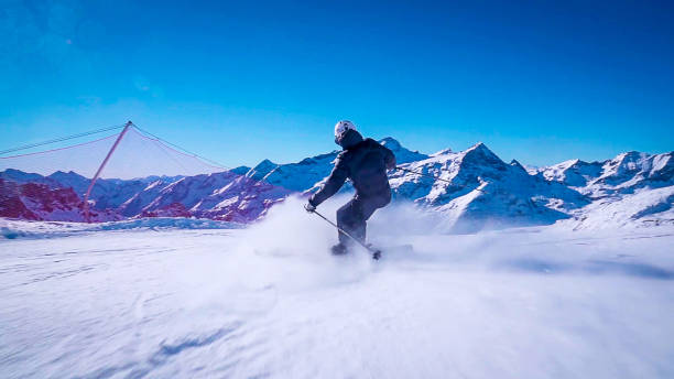istock Professional ski instructor speed skiing on Italian Alps (Monte Rosa) 2151247963