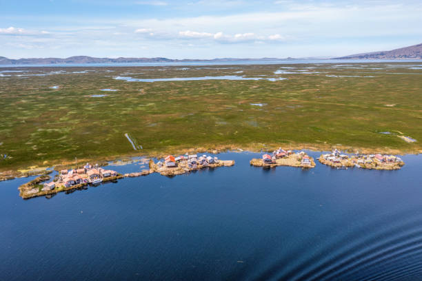 Uros Islands, Lake Titicaca, Peru: The floating islands of Uros are located in Lake Titicaca, the world's highest navigable lake, close to Puno at 3.812 metres above sea level. These floating islands are made out of reed which is an aquatic plant that grows on the surface of the Lake Titicaca.
