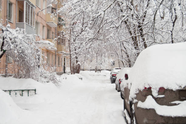 istock Snow-covered cars. 2151251181