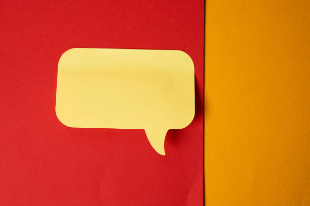 istock Yellow sticky note on double colorful background top view Copy Space 2151252559