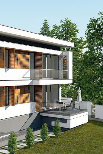 Modern villa with stone tiles and wooden shades on windows. Architecture concept for Real estate. Copy space.