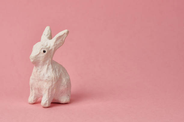 istock Easter bunny on a pink background toy animal holidays 2151253308