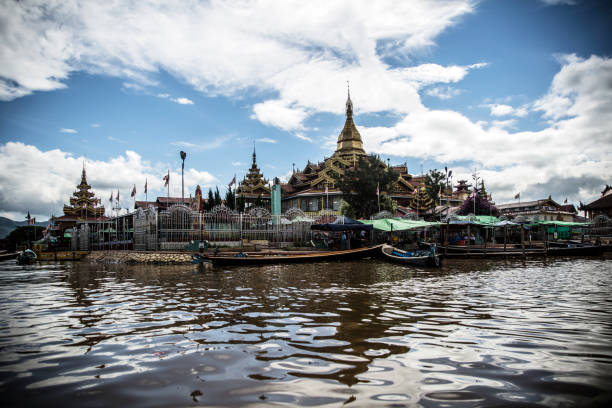 Inle Lake, Myanmar - October 17, 2017: It is a revered Buddhist site renowned for its intricate architecture and spiritual significance. Adorned with ornate carvings and surrounded by lush gardens, the pagoda offers a serene retreat for prayer and meditation. It stands as a testament to Myanmar's rich cultural heritage and serves as a place of reverence and pilgrimage for Buddhists from around the world.
