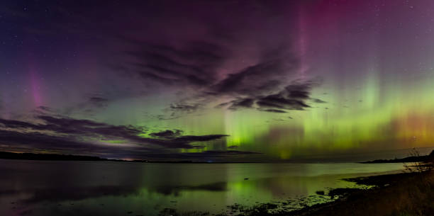 istock Aurora Borealis over Budle Bay 2151258553