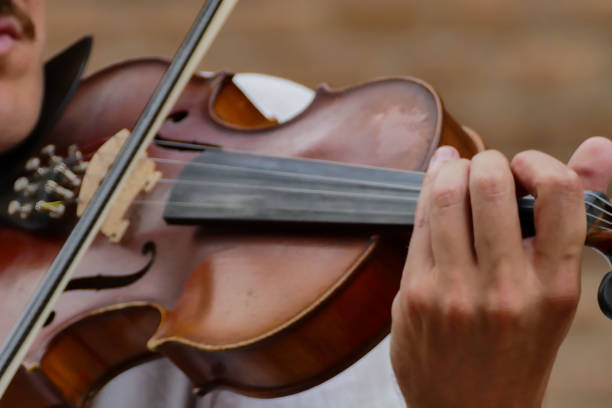 istock Person playing music outdoors 2151263622