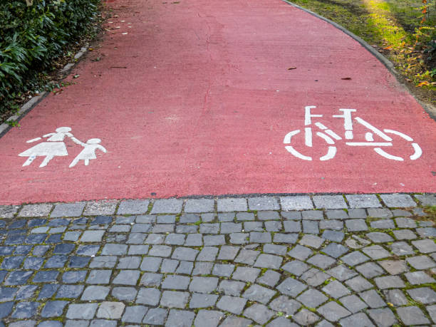 istock bicycle lane sign on the road 2151267043