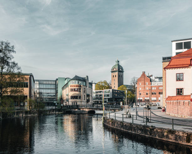 istock Viskaholm building in Boras, with Viskan river in foreground 2151267350