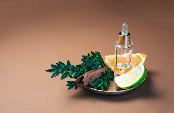 istock Aromatherapy and perfumery background, adorned with cinnamon sticks, lime, orange and the finest essential oils, celebrating the allure of nature's bounty in crafting aromatic delights. 2151269391