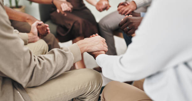 istock Circle, group and therapy for support, hands and listening with advice, empathy and kindness for counselling. Conversation, men and women with communication, meeting or consultation for therapist 2151270242