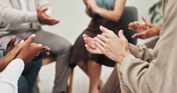istock Therapy, applause and group of hands in circle for support, breakthrough and achievement for mental health. Psychology, wellness and men and women clapping for empathy, help or celebration in session 2151270282