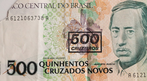Old Brazilian money note, with Central Bank stamp changing the denomination and value, from Cruzados Novas, to Cruzeiro, due to economic plans to contain inflation in the 1990s
