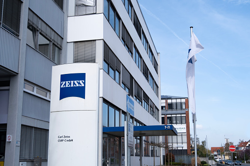 modern building featuring with Advertising signboard Carl Zeiss company in Goettingen, production high-quality microscopes, telescopes, optical devices, Göttingen, Germany - March 31, 2024