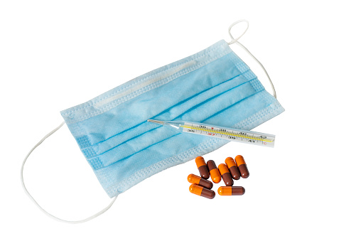protective medical mask, thermometer and pill capsules.  Isolated on transparent. PNG format available non-standard bottom view
